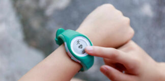 Person using a fitness tracker on their wrist