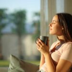 Daylight’s Secret Role in Blood Sugar Control Woman enjoying a cup of coffee in a sunlit room