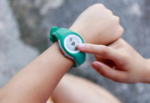 Person using a fitness tracker on their wrist