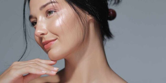 shutterstock_2505627923.jpg Close-up portrait of a woman with glowing skin and a gentle smile