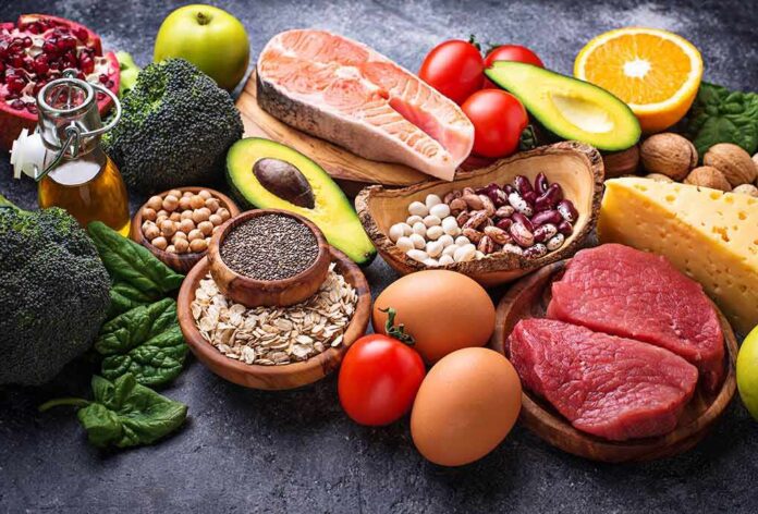 Assorted healthy foods arranged on a dark surface