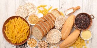 Assorted grains and breads on a wooden table