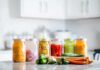 Kitchen Hack That SLASHES Hormone Disruptors Assorted pickled vegetables in jars on a kitchen counter