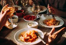 The Physical Toll Of Skipping Vegetables In Meals Pasta dinner with wine on a sunlit table