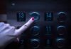 Elevator Habit? Cardiologists Sound Alarm finger pressing elevator button for floor 13