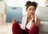 Weight Paradox Stuns Cancer Researchers Woman holding a bathroom scale with a frustrated expression