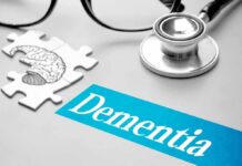 Dementia Risk PLUNGES With Tiny Habit Stethoscope and brain puzzle piece on desk