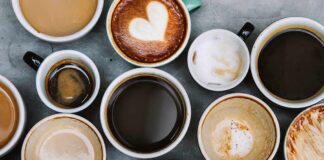 Assorted coffee cups arranged on a tabletop