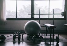 Over-50 Muscle Gains Without Daily Lifting home gym with weights and exercise ball